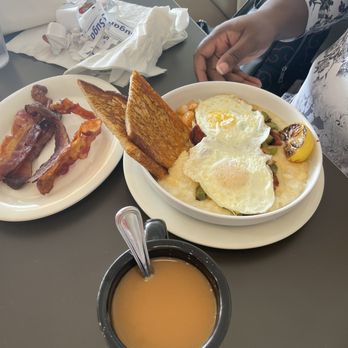Eggs Up Grill - Shrimp and grits with two eggs and toast - Breakfast & Brunch Near Me - Apopka, Florida