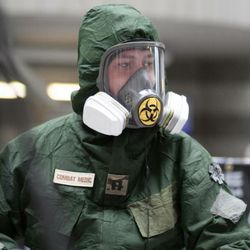 AmericanCopCar - This is one of our team in full hazmat kit for a Zombie Convention. www.AmericanCopCar.Com
