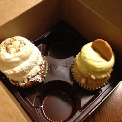 Gigi's Cupcakes of Wauwatosa - White chocolate pumpkin and banana cream pie, both piled high with frosting!