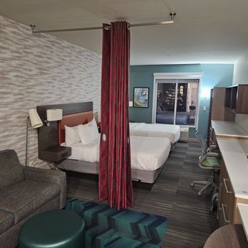 Home2 Suites by Hilton Savannah Midtown - The living room bedroom - Hotels Near Me - Savannah, Georgia
