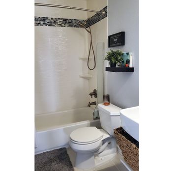 ProBuilt Bath & Kitchen - Love the new textured shower panels, in-wall storage and corner shelves. The inlaid tile at the top is a really nice accent! - General Contractors Near Me ProBuilt Bath & Kitchen - Love the new textured shower panels, in-wall storage and corner shelves. The inlaid tile at the top is a really nice accent! - General Contractors Near Me