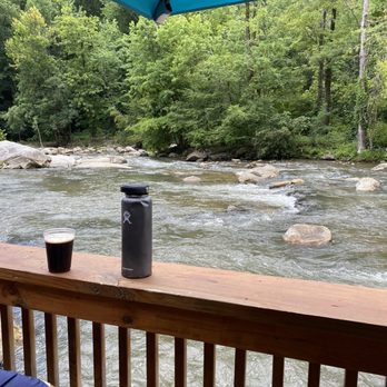 Chimney Rock Brewing - What a view on the bottom deck, right on the River - Breweries Near Me - Chimney Rock, North Carolina