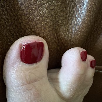 YOLO NAILS - Corner of toenail cut off and didn't clean up her polish on the skin. - Waxing Near Me - Basehor, Kansas YOLO NAILS - Corner of toenail cut off and didn't clean up her polish on the skin. - Waxing Near Me - Basehor, Kansas