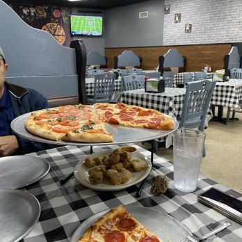 Mozza Pizza Restaurant - Large Half Margherita and 1/2 Pepperoni pie $12.99. - Pizza Near Me - Huntsville, Alabama Mozza Pizza Restaurant - Large Half Margherita and 1/2 Pepperoni pie $12.99. - Pizza Near Me - Huntsville, Alabama
