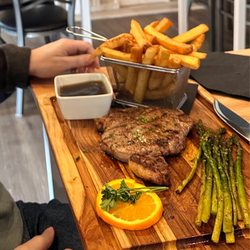 Edgewater Lounge - Ribeye Steak with asparagus and fries.