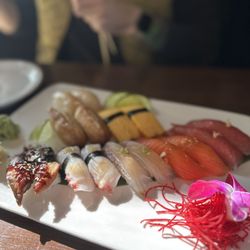 Ikura - Scallop sushi, omelette sushi, tofu skin sushi, eel sushi, octopus (taco) sushi, madori sushi, salmon sushi, tuna sushi