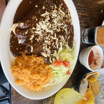 Santo Remedio - Chicken mole enchiladas - Mexican Near Me - Denver, Colorado Santo Remedio - Chicken mole enchiladas - Mexican Near Me - Denver, Colorado