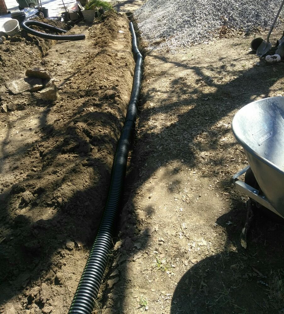 Slide of Benson's Drainage Solutions