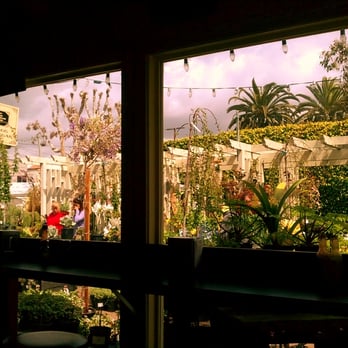 Nick's Deli - The view from the sheltered porch looks out into the garden - Delis Near Me - Seal Beach, California Nick's Deli - The view from the sheltered porch looks out into the garden - Delis Near Me - Seal Beach, California