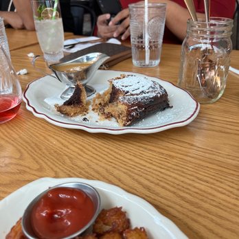 Haberdish - The cinnamon. Caramel drizzle and powdered sugar. Has a strong spicy flavor. - Southern Near Me - Charlotte, North Carolina Haberdish - The cinnamon. Caramel drizzle and powdered sugar. Has a strong spicy flavor. - Southern Near Me - Charlotte, North Carolina