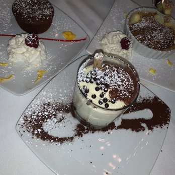 Trattoria Amici - Clockwise starting from left: chocolate lava cake, crepe brûlée, tiramisu - Italian Near Me - Glendale, California Trattoria Amici - Clockwise starting from left: chocolate lava cake, crepe brûlée, tiramisu - Italian Near Me - Glendale, California