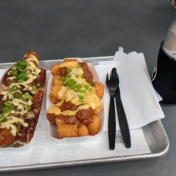 Dog Haus - Oktoberwurst (left) & chili cheese tater tots (center) - Burgers Near Me - Chino Hills, California Dog Haus - Oktoberwurst (left) & chili cheese tater tots (center) - Burgers Near Me - Chino Hills, California