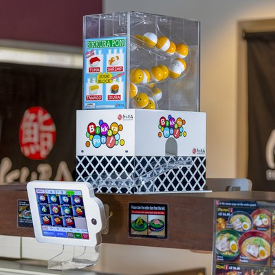 Kura Revolving Sushi Bar by null