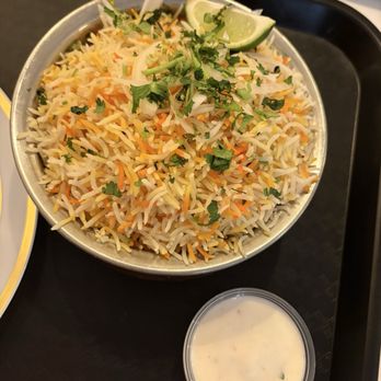 Tikka N Taco - Chicken Biryani, the meat is under the rice. This was super spicy though. - Mexican Near Me - Phoenix, Arizona