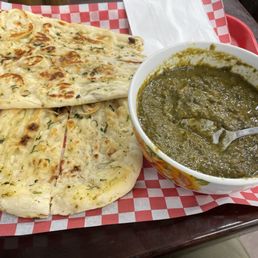 Spanish chicken dal and garlic naan bread. Spanish chicken dal and garlic naan bread.