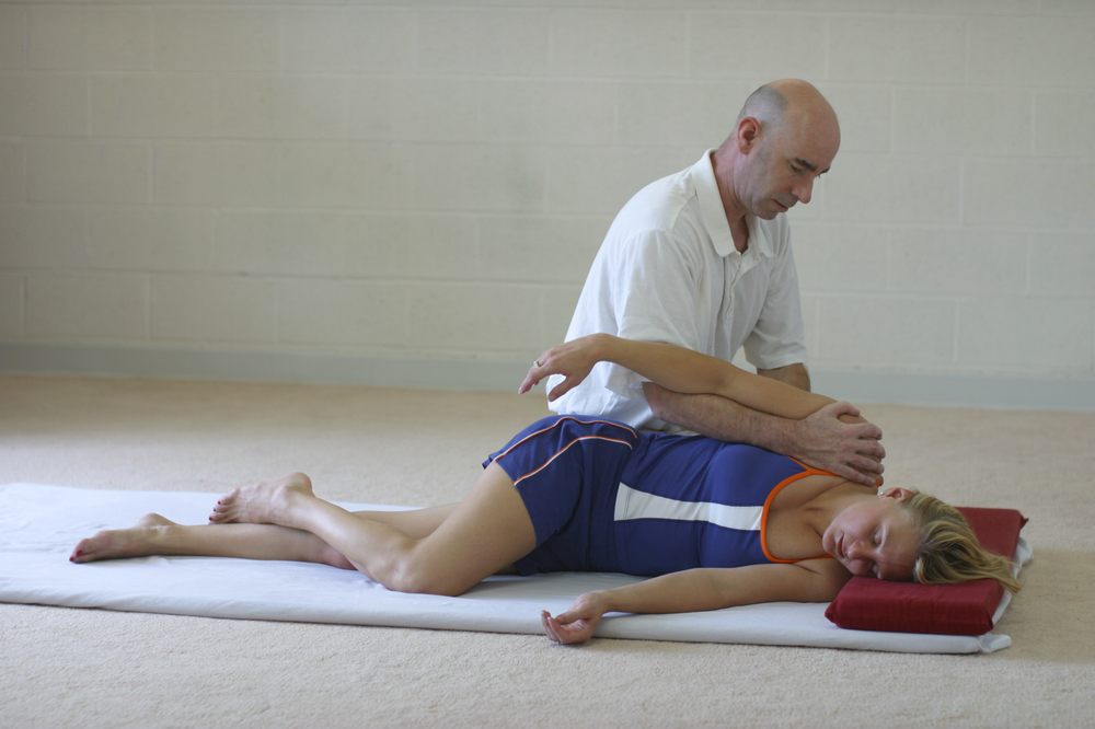 OM Yoga Studio and School of Thai Massage Logo