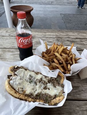 Malik's Philly's Phamous Cheesesteaks by null