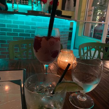 Limon y Sal - two glasses of alcohol on a table - Peruvian Near Me - Miami Beach, Florida Limon y Sal - two glasses of alcohol on a table - Peruvian Near Me - Miami Beach, Florida