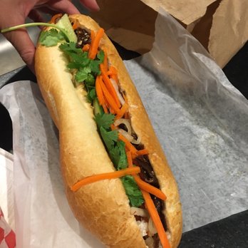 Sapa - a person's hand holding a sub sandwich - Ice Cream & Frozen Yogurt Near Me - Montreal, Quebec Sapa - a person's hand holding a sub sandwich - Ice Cream & Frozen Yogurt Near Me - Montreal, Quebec