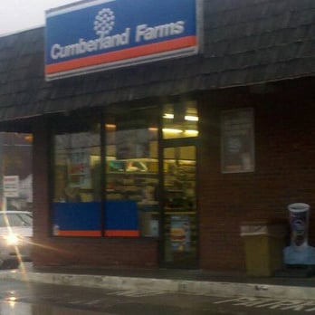 Cumberland Farms - the front of a store on a rainy day - Convenience Stores Near Me - Dudley, Massachusetts