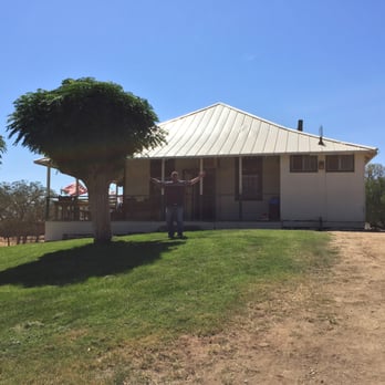 Hills Pride Inn - a man standing in front of a house - Bars Near Me - Raymond, California Hills Pride Inn - a man standing in front of a house - Bars Near Me - Raymond, California