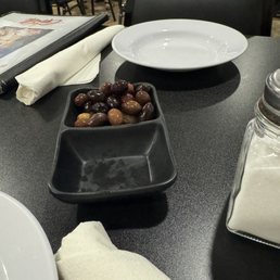 Delicious meats olives and bread before dinner and a fun vibe :) Delicious meats olives and bread before dinner and a fun vibe :)