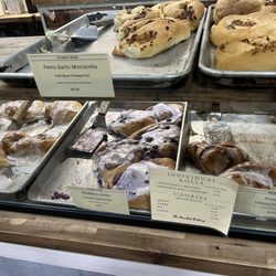 The Market Bakery - Blueberry cinnamon roll, Apple Cinnamon Roll, Plain Cinnamon Roll, Pesto Garlic Mozzarella Roll