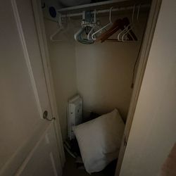 Our closet. Complete with bedding on the floor.