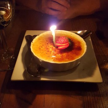 Ravens' Restaurant - Creme brulee. Coconut milk base but not too strongly coco flavored. Very good. Candle is for a birthday celebration. - Vegan Near Me - Mendocino, California