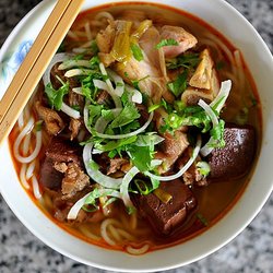 Pho Time - Bun Bo Hue ( spicy beef, pork blood, pork feet, tendon, steamed pork, noodle, green onion, white onion and cilantro )