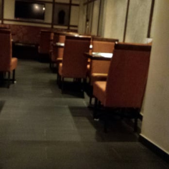 Erawan - a restaurant with tables and chairs - Thai Near Me - Quebec City, Quebec Erawan - a restaurant with tables and chairs - Thai Near Me - Quebec City, Quebec
