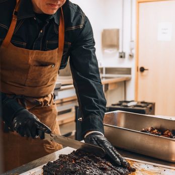 Doc's Bar-B-Que - Slicin' Brisket - Caterers Near Me