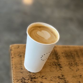Druthers Coffee - a cup of coffee on a table - Coffee & Tea Near Me - Stony Brook, New York Druthers Coffee - a cup of coffee on a table - Coffee & Tea Near Me - Stony Brook, New York