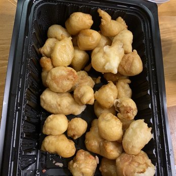 Hong Kong Express - Sweet and sour pork. Notice the couple with like white on it? Those were soggy. No carrots no pineapple. Just jar sauce. - Chinese Near Me - Little Elm, Texas
