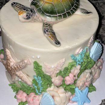 Sugar Daze Dessert Shop - Italian cream cake with sea turtle decor - Bakeries Near Me - Madison, Mississippi Sugar Daze Dessert Shop - Italian cream cake with sea turtle decor - Bakeries Near Me - Madison, Mississippi