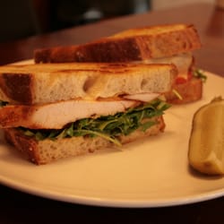 Harvest Deli - #25: Free range roasted chicken breast, arugula, tomato, Harvest Russian dressing & Swiss on grilled Tuscan bread!