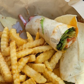Huey Magoo's Chicken Tenders - Buffalo chicken wrap. Fries with extra seasoning - Chicken Shop Near Me - Dacula, Georgia Huey Magoo's Chicken Tenders - Buffalo chicken wrap. Fries with extra seasoning - Chicken Shop Near Me - Dacula, Georgia