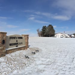 Steve's Towing & Recovery - This sign is out near the hwy, so you should see it before you drive past and hit the curve.
