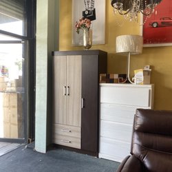 Wardrobe and chest on the floor. They also have nice wall art throughout the store.