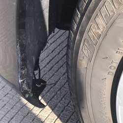 Hertz Rent A Car - Zip-tied broken fender