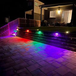 E & C Lawn Care Construction - Light installation for retaining wall patio
