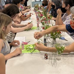 War Memorial Complex - Maui Matsuri 2023 - making a mini flower arrangement