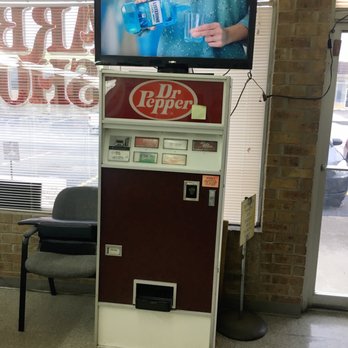 Richerson’s Barber Shop - Their soda machine that although it struggles to keep drinks cold, it's still pretty cool and it works. - Barbers Near Me - Fort Worth, Texas Richerson’s Barber Shop - Their soda machine that although it struggles to keep drinks cold, it's still pretty cool and it works. - Barbers Near Me - Fort Worth, Texas