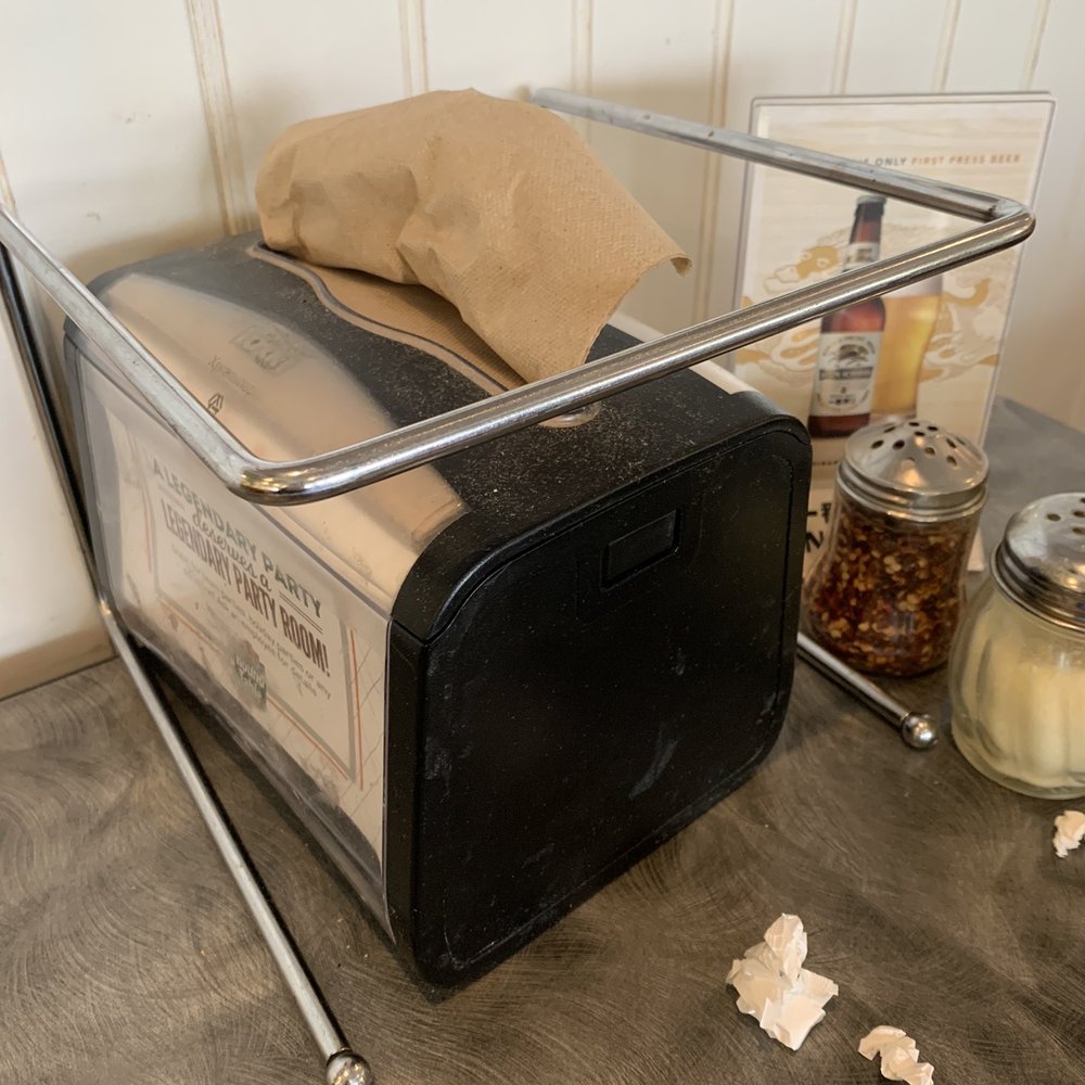 Round Table Pizza - Dusty napkin dispenser - Pizza Near Me - Kailua, Hawaii Round Table Pizza - Dusty napkin dispenser - Pizza Near Me - Kailua, Hawaii