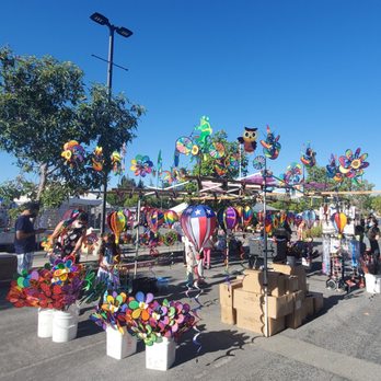 Cupertino Night Market - Colorful pinwheels and other items for sale - Festivals Near Me - Cupertino, California Cupertino Night Market - Colorful pinwheels and other items for sale - Festivals Near Me - Cupertino, California