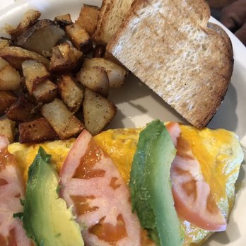 Coffee Pub - Works omelette, ham, bacon, cheddar cheese with fresh tomatoes and avocado - Breakfast & Brunch Near Me - Las Vegas, Nevada