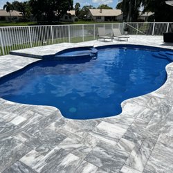 Superb Pools - Witness the breathtaking transformation of this pool! From dull to dazzling, we've created a stunning oasis.