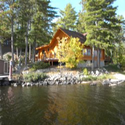 Crane Lake Wilderness Lodge - Large sturdy crib dock the will handle a large boat on either side. Full electric dock. Large deck with gas grill overlooking lake