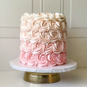 Fruitique - a close up of a pink and white cake - Chocolatiers & Shops Near Me Fruitique - a close up of a pink and white cake - Chocolatiers & Shops Near Me