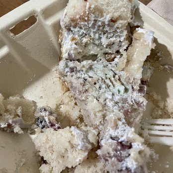 The Grain Cafe - Slice of Strawberry Almond straight out of the cake on display. Not spinach, that's fungi, that stunk. The cake was literally rotten. - Pizza Near Me - Redondo Beach, California